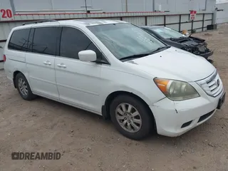 2010 Honda Odyssey EX-L z VIN 5FNRL3H78AB030254, wystawiony jako IAAI lot #42742510 z przebiegiem 277 913 mil mil oraz . Historia ofert i sprzedaży dostępna na DreamBid. Obrazek 1.