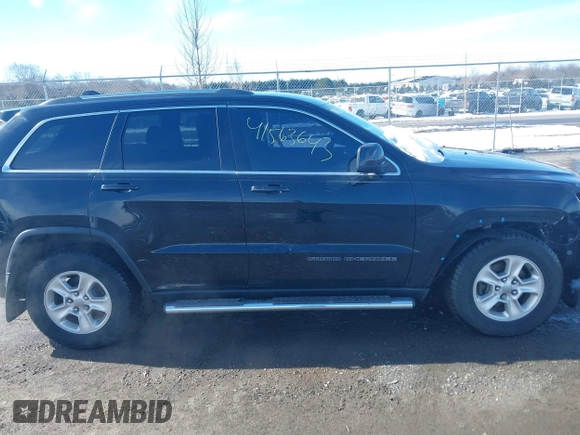 2017 Jeep Grand Cherokee Laredo with VIN 1C4RJEAGXHC685888, listed as a IAAI auction lot 41563643 with 193,997 mi miles. Bid and sale history available at carsss.com. Image 13.