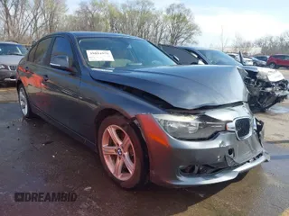 2014 BMW 3 Series 320i xDrive with VIN WBA3C3G51ENS71003, listed as a IAAI auction lot 39894979 with 99,655 mi miles. Bid and sale history available at carsss.com. Image 1.
