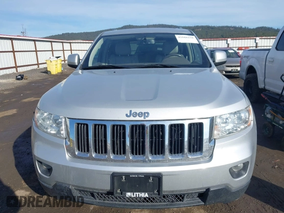 2011 Jeep Grand Cherokee 70th Anniversary with VIN 1J4RR4GTXBC718994, listed as a IAAI auction lot 41688158 with 121,680 mi miles. Bid and sale history available at carsss.com. Image 12.