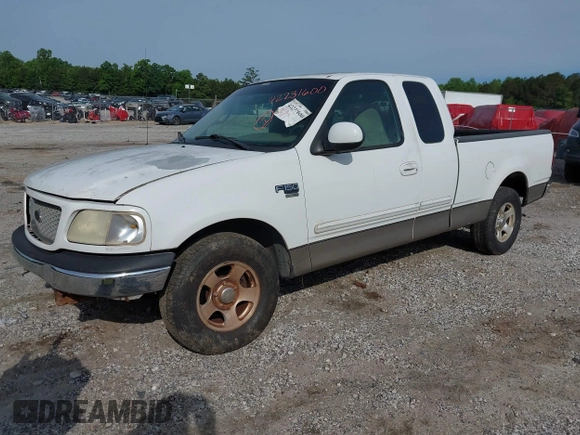 2001 Ford F-150 XL z VIN 1FTRX17WX1NA20036, wystawiony jako IAAI lot #42231600 z przebiegiem 181 549 mil mil oraz . Historia ofert i sprzedaży dostępna na DreamBid. Obrazek 2.