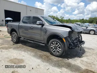 2024 Ford Ranger Lariat with VIN 1FTER4KH3RLE10731, listed as a Copart auction lot 60604675 with 8,566 mi miles and Salvage title. Bid and sale history available at DreamBid. Image 4.