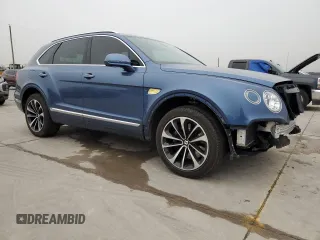 2019 Bentley Bentayga V8 z VIN SJAAM2ZV5KC024865, wystawiony jako Copart lot #42869533 z przebiegiem 23 687 mil mil oraz . Historia ofert i sprzedaży dostępna na DreamBid. Obrazek 4.