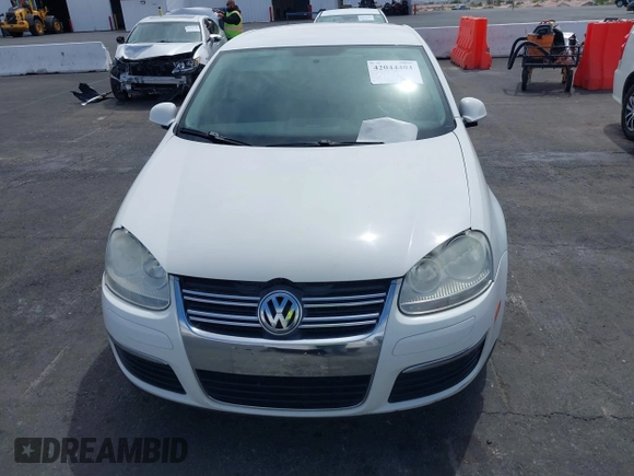 2010 Volkswagen Jetta Sedan S with VIN 3VWJZ7AJ9AM037277, listed as a IAAI auction lot 42044404 with 129,823 mi miles. Bid and sale history available at carsss.com. Image 6.