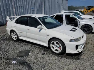 1998 Mitsubishi Lancer z VIN 000000CP9A0001997, wystawiony jako Copart lot #68862654 z przebiegiem 164 292 mil mil oraz Szkoda całkowita • Salvage title. Historia ofert i sprzedaży dostępna na DreamBid. Obrazek 4.