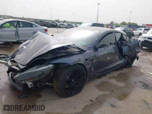 2021 Tesla Model S Plaid z VIN 5YJSA1E6XMF429436, wystawiony jako IAAI lot #41826114 z przebiegiem Nie podano mil oraz . Historia ofert i sprzedaży dostępna na DreamBid. Obrazek 19.