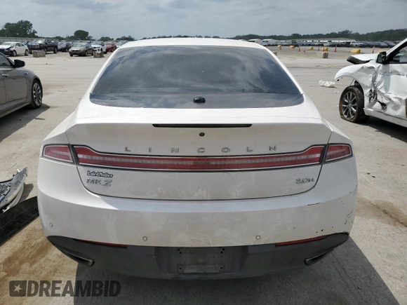 2014 Lincoln MKZ Hybrid z VIN 3LN6L2LU2ER816576, wystawiony jako Copart lot #57030235 z przebiegiem 221 863 mil mil oraz Szkoda całkowita • Salvage title. Historia ofert i sprzedaży dostępna na DreamBid. Obrazek 6.
