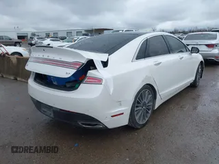 2014 Lincoln MKZ with VIN 3LN6L2GK2ER804677, listed as a IAAI auction lot 41553543 with 123,661 mi miles. Bid and sale history available at carsss.com. Image 4.