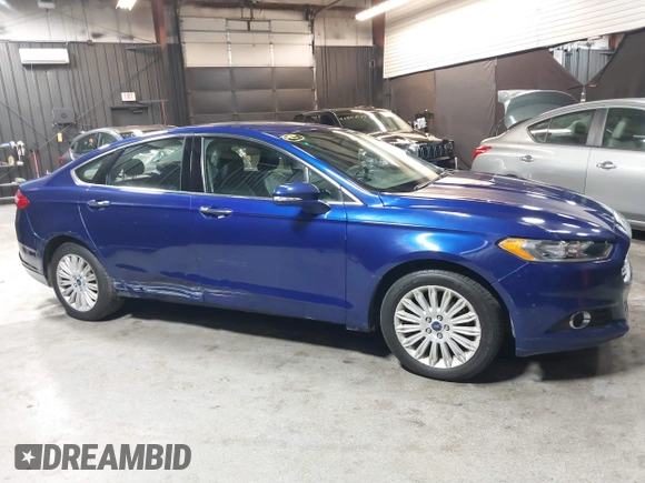 2016 Ford Fusion SE Hybrid with VIN 3FA6P0LU0GR242288, listed as a IAAI auction lot 41867085 with 114,063 mi miles. Bid and sale history available at carsss.com. Image 13.
