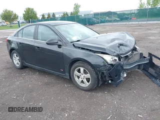 2014 Chevrolet Cruze 1LT z VIN 1G1PC5SB6E7138943, wystawiony jako IAAI lot #42368233 z przebiegiem 119 760 mil mil oraz . Historia ofert i sprzedaży dostępna na DreamBid. Obrazek 1.