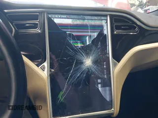 2016 Tesla Model S 90D with VIN 5YJSA1E24GF141543, listed as a IAAI auction lot 42045333 with Not Provided miles and . Bid and sale history available at DreamBid. Image 18.