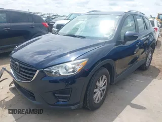 2016 Mazda CX-5 Sport z VIN JM3KE2BY0G0633611, wystawiony jako IAAI lot #42390654 z przebiegiem Nie podano mil oraz . Historia ofert i sprzedaży dostępna na DreamBid. Obrazek 2.