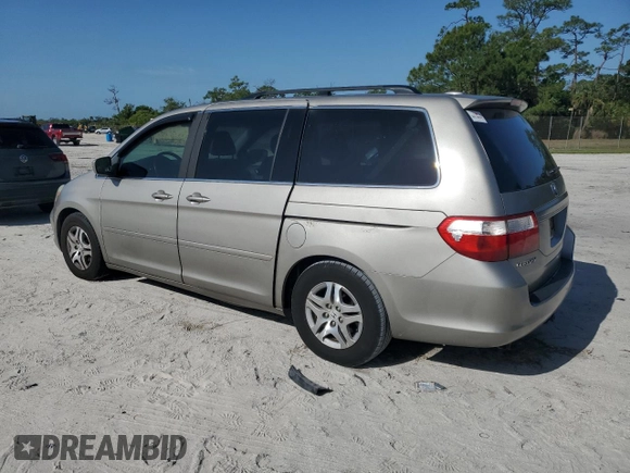 2007 Honda Odyssey EX-L with VIN 5FNRL387X7B043046, listed as a Copart auction lot 52604635 with 228,961 mi miles and Salvage Title. Bid and sale history available at carsss.com. Image 2.