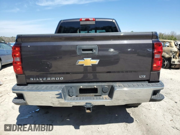 2014 Chevrolet Silverado 1500 LTZ with VIN 3GCUKSEC5EG211708, listed as a Copart auction lot 46094635 with 112,980 mi miles and Salvage Title. Bid and sale history available at DreamBid. Image 6.