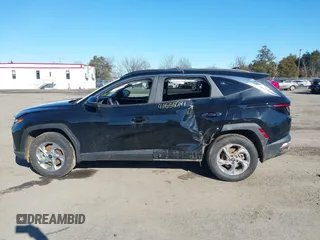 2023 Hyundai Tucson SEL with VIN 5NMJBCAE0PH275940, listed as a IAAI auction lot 41555091 with 60,171 mi miles and . Bid and sale history available at DreamBid. Image 13.