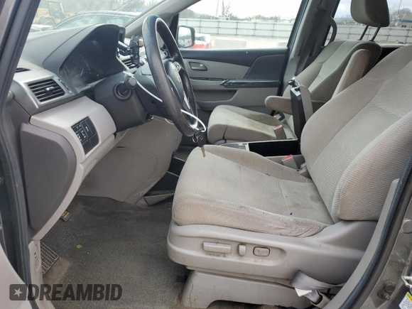 2013 Honda Odyssey EX z VIN 5FNRL5H40DB033400, wystawiony jako Copart lot #50552155 z przebiegiem 223 770 mil mil oraz Nie do naprawy. Historia ofert i sprzedaży dostępna na DreamBid. Obrazek 7.