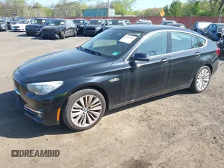2014 BMW 5 Series GT 535i Gran Turismo xDrive with VIN WBA5M4C56ED183815, listed as a IAAI auction lot 42155348 with 150,357 mi miles and . Bid and sale history available at carsss.com. Image 2.