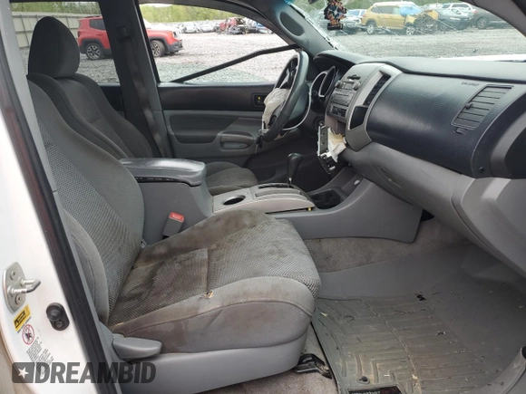 2011 Toyota Tacoma PreRunner with VIN 3TMJU4GN5BM113539, listed as a Copart auction lot 52208635 with 304,559 mi miles and Salvage Title. Bid and sale history available at DreamBid. Image 7.