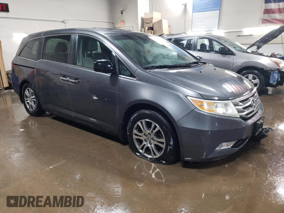 2012 Honda Odyssey EX-L with VIN 5FNRL5H69CB143572, listed as a Copart auction lot 48614255 with 114,490 mi miles and Salvage Title. Bid and sale history available at carsss.com. Image 4.