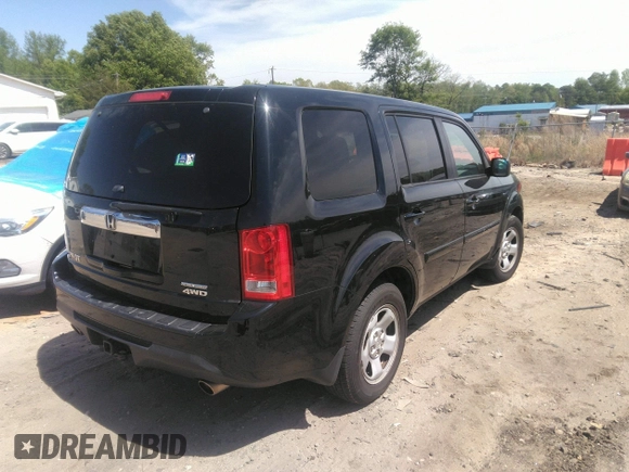 2015 Honda Pilot SE with VIN 5FNYF4H38FB071223, listed as a IAAI auction lot 42013352 with 196,617 mi miles and . Bid and sale history available at DreamBid. Image 4.