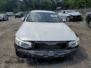 2014 BMW 4 Series 428i xDrive z VIN WBA3T1C56EPS98910, wystawiony jako Copart lot #65903985 z przebiegiem 95 328 mil mil oraz Szkoda całkowita • Salvage title. Historia ofert i sprzedaży dostępna na DreamBid. Obrazek 5.