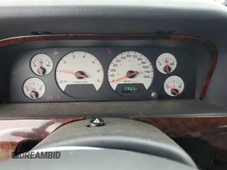 2001 Jeep Grand Cherokee Limited with VIN 1J4GW58N91C653866, listed as a Copart auction lot 58546895 with 159,661 mi miles and Salvage title. Bid and sale history available at DreamBid. Image 9.