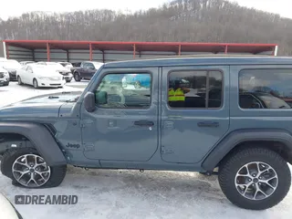 2024 Jeep Wrangler Sport S with VIN 1C4PJXDN2RW306332, listed as a IAAI auction lot 41036573 with 1,785 mi miles and . Bid and sale history available at DreamBid. Image 14.