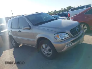 2002 Mercedes-Benz M-Class with VIN 4JGAB54E12A353387, listed as a IAAI auction lot 40464364 with 199,324 mi miles. Bid and sale history available at carsss.com. Image 1.