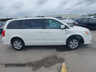 2011 Dodge Grand Caravan Crew with VIN 2D4RN5DGXBR786592, listed as a IAAI auction lot 42114198 with 243,423 mi miles and . Bid and sale history available at DreamBid. Image 13.
