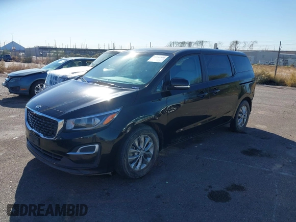 2020 Kia Sedona EX with VIN KNDMB5C11L6594029, listed as a IAAI auction lot 40951800 with 164,989 mi miles. Bid and sale history available at carsss.com. Image 18.