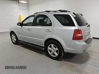 2007 Kia Sorento LX z VIN KNDJD736075700860, wystawiony jako Copart lot #82119114 z przebiegiem 290 641 mil mil oraz Czysty tytuł • Clean title. Historia ofert i sprzedaży dostępna na DreamBid. Obrazek 2.