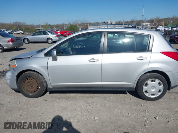 2009 Nissan Versa 1.8 SL with VIN 3N1BC13E09L393563, listed as a IAAI auction lot 41977998 with 163,072 mi miles. Bid and sale history available at carsss.com. Image 14.