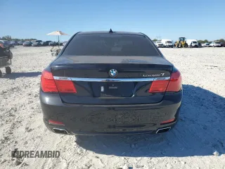 2011 BMW 7 Series with VIN WBAKX8C55BC198177, listed as a Copart auction lot 77016924 with 99,275 mi miles and Salvage title. Bid and sale history available at DreamBid. Image 6.