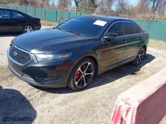 2014 Ford Taurus SHO with VIN 1FAHP2KT0EG164404, listed as a IAAI auction lot 41899695 with 157,077 mi miles. Bid and sale history available at carsss.com. Image 18.