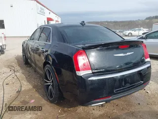 2015 Chrysler 300 C with VIN 2C3CCAEG8FH908477, listed as a IAAI auction lot 41702256 with 140,017 mi miles and . Bid and sale history available at carsss.com. Image 3.