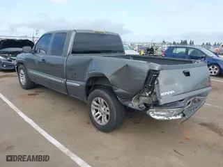 2002 GMC Sierra 1500 SLE with VIN 2GTEC19V121231109, listed as a IAAI auction lot 41906878 with 237,729 mi miles. Bid and sale history available at carsss.com. Image 3.