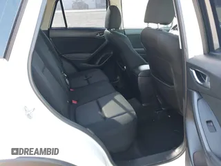 2014 Mazda CX-5 Sport with VIN JM3KE2BE8E0301175, listed as a IAAI auction lot 42051972 with 121,821 mi miles and . Bid and sale history available at carsss.com. Image 8.