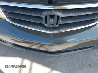 2004 Honda Odyssey EX with VIN 5FNRL18624B056333, listed as a IAAI auction lot 42143860 with 165,687 mi miles and . Bid and sale history available at DreamBid. Image 6.