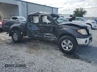2010 Nissan Frontier Pro-4X with VIN 1N6AD0EV2AC401933, listed as a Copart auction lot 53980575 with 188,170 mi miles and Salvage title. Bid and sale history available at DreamBid. Image 4.