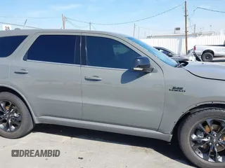 2021 Dodge Durango R/T with VIN 1C4SDHCT9MC573095, listed as a IAAI auction lot 41852401 with 63,492 mi miles and . Bid and sale history available at DreamBid. Image 13.