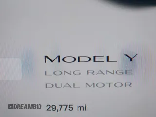 2023 Tesla Model Y Long Range with VIN 7SAYGDEE8PF612438, listed as a IAAI auction lot 41991145 with 29,775 mi miles and . Bid and sale history available at carsss.com. Image 15.