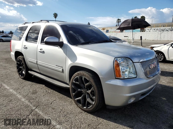 2014 GMC Yukon SLT with VIN 1GKS1CE05ER197674, listed as a Copart auction lot 45934674 with 130,623 mi miles and Salvage Title. Bid and sale history available at carsss.com. Image 4.