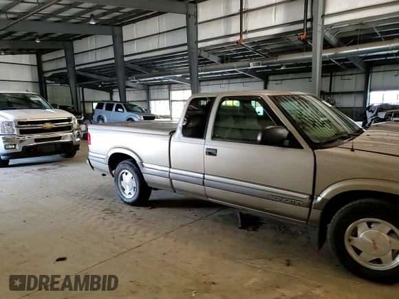 2000 GMC Sonoma SLS z VIN 1GTCS19W0Y8146125, wystawiony jako Copart lot #71576724 z przebiegiem 73 854 mil mil oraz Szkody całkowita. Historia ofert i sprzedaży dostępna na DreamBid. Obrazek 11.