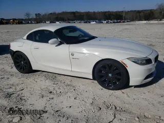 2011 BMW Z4 sDrive30i with VIN WBALM5C5XBE379064, listed as a Copart auction lot 87475414 with 105,420 mi miles and Salvage Title. Bid and sale history available at carsss.com. Image 4.