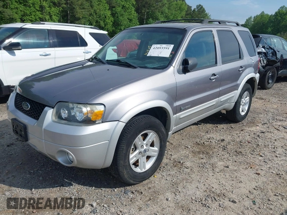 2007 Ford Escape Hybrid with VIN 1FMCU49H47KA90605, listed as a IAAI auction lot 42093591 with 136,924 mi miles and . Bid and sale history available at DreamBid. Image 17.