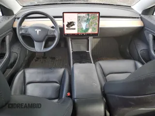 2019 Tesla Model 3 Mid Range with VIN 5YJ3E1EA1KF397390, listed as a Copart auction lot 49862915 with 63,698 mi miles and Salvage Title. Bid and sale history available at carsss.com. Image 8.