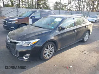 2013 Toyota Avalon XLE with VIN 4T1BK1EB8DU046429, listed as a IAAI auction lot 42092348 with 344,339 mi miles and . Bid and sale history available at DreamBid. Image 2.