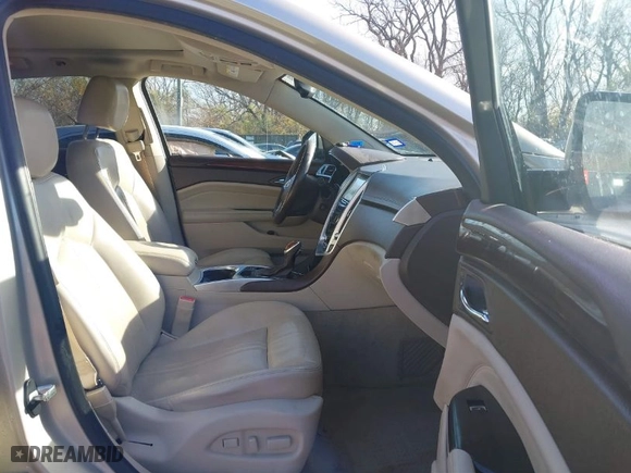 2015 Cadillac SRX Premium Collection with VIN 3GYFNDE35FS570576, listed as a IAAI auction lot 40922524 with 154,557 mi miles. Bid and sale history available at carsss.com. Image 5.