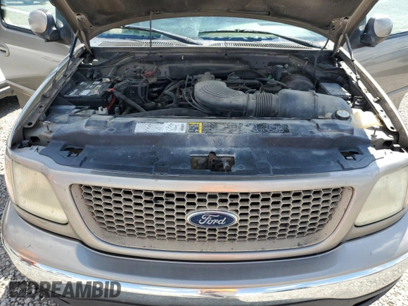 2002 Ford F-150 XL с VIN 1FTRX18L52NB25220, выставлен на аукционе Copart как лот 58202165 с пробегом 298 885 миль миль и Списание • Salvage title. История ставок и продаж доступна на DreamBid. Изображение 11.