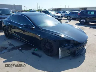 2021 Tesla Model S Long Range Plus with VIN 5YJSA1E28MF426080, listed as a IAAI auction lot 41979326 with 125,328 mi miles and . Bid and sale history available at DreamBid. Image 1.